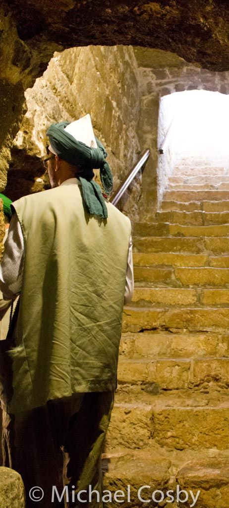 Fig. 32. Sufi men respectfully praying at the tomb of Barnabas.