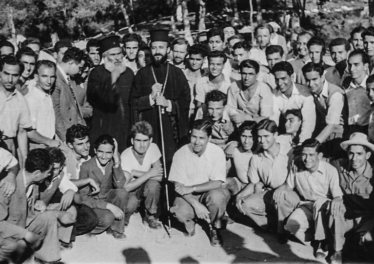 Fig. 12. Makarios with a group of Cypriot men.